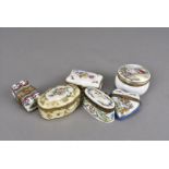 A small collection of Limoges porcelain boxes, decorated variously with fete gallants, floral