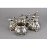 A Victorian silver plated four piece tea set, by James Dixon & Sons, the tea pot lid AF (4)