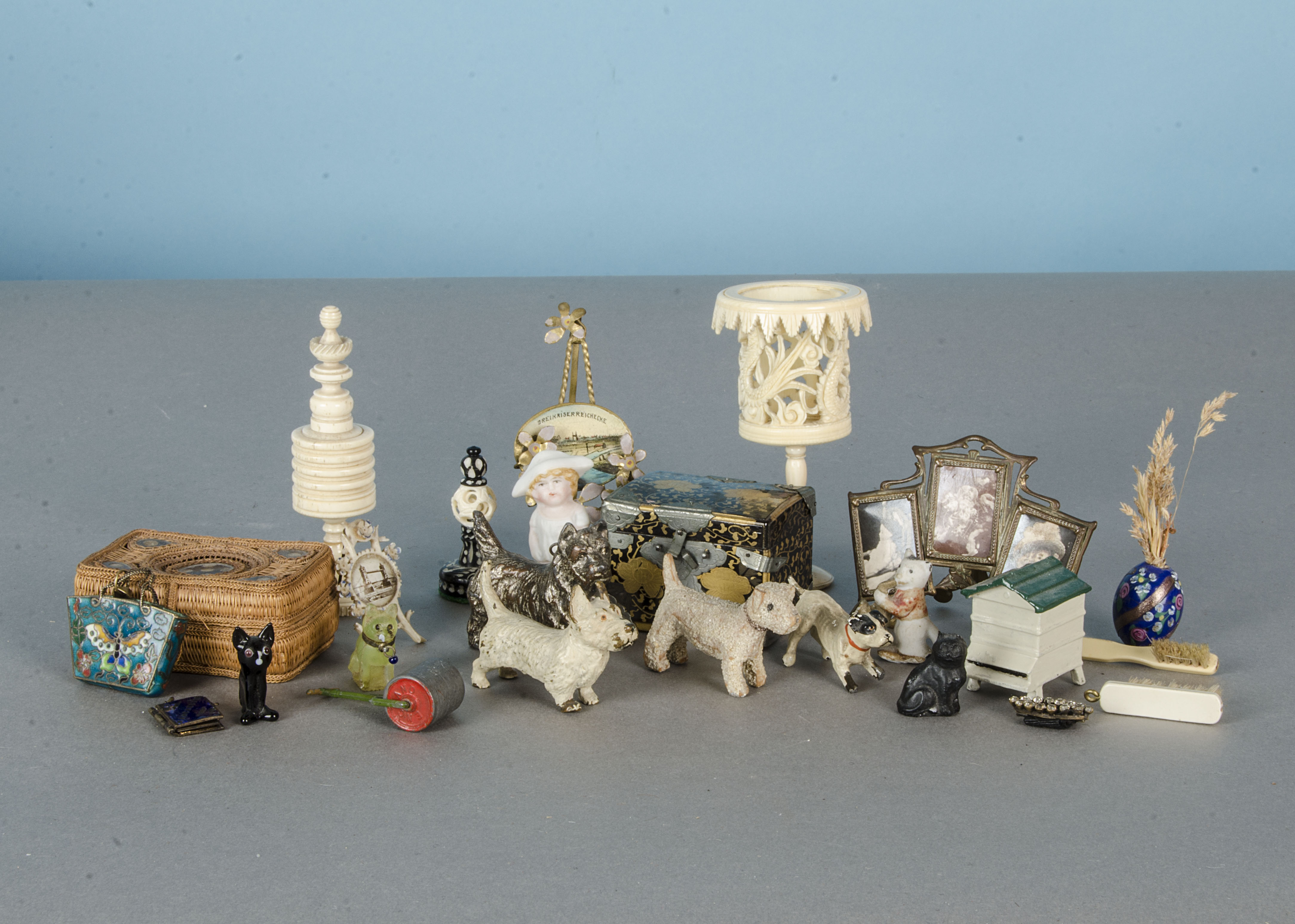 Miniature items: including a cold painted bronze West Highland terrier; a Forest Toy dog; an Art