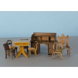 Dolls’ house furniture: an oak desk, a Schneegas work table (replaced drawer), chairs and other