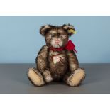 A rare Steiff prototype replica Petsy bear, with brown tipped white mohair, blue plastic eyes,