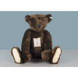 A Steiff Limited Edition British Collector’s 1907 replica Teddy Bear, dark brown, 873 of 3000, in