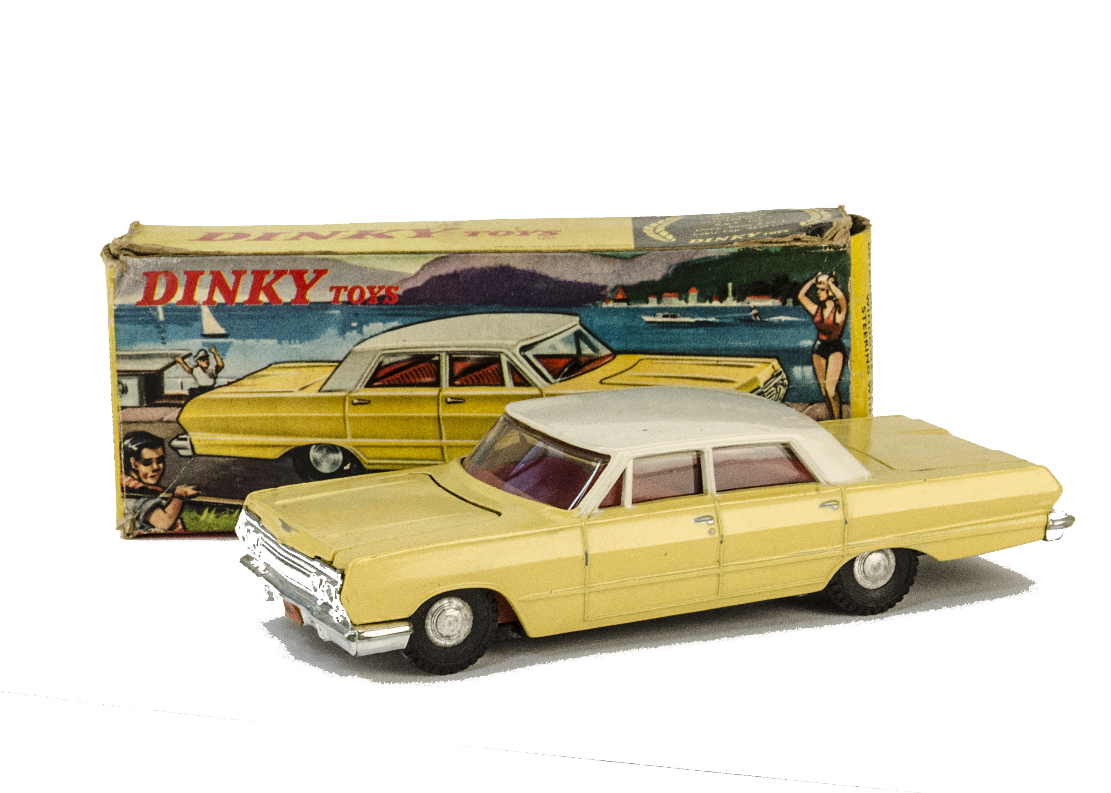 A Hong Kong Dinky Toys 57/003 Chevrolet Impala, pale yellow body, white roof, red interior, cast