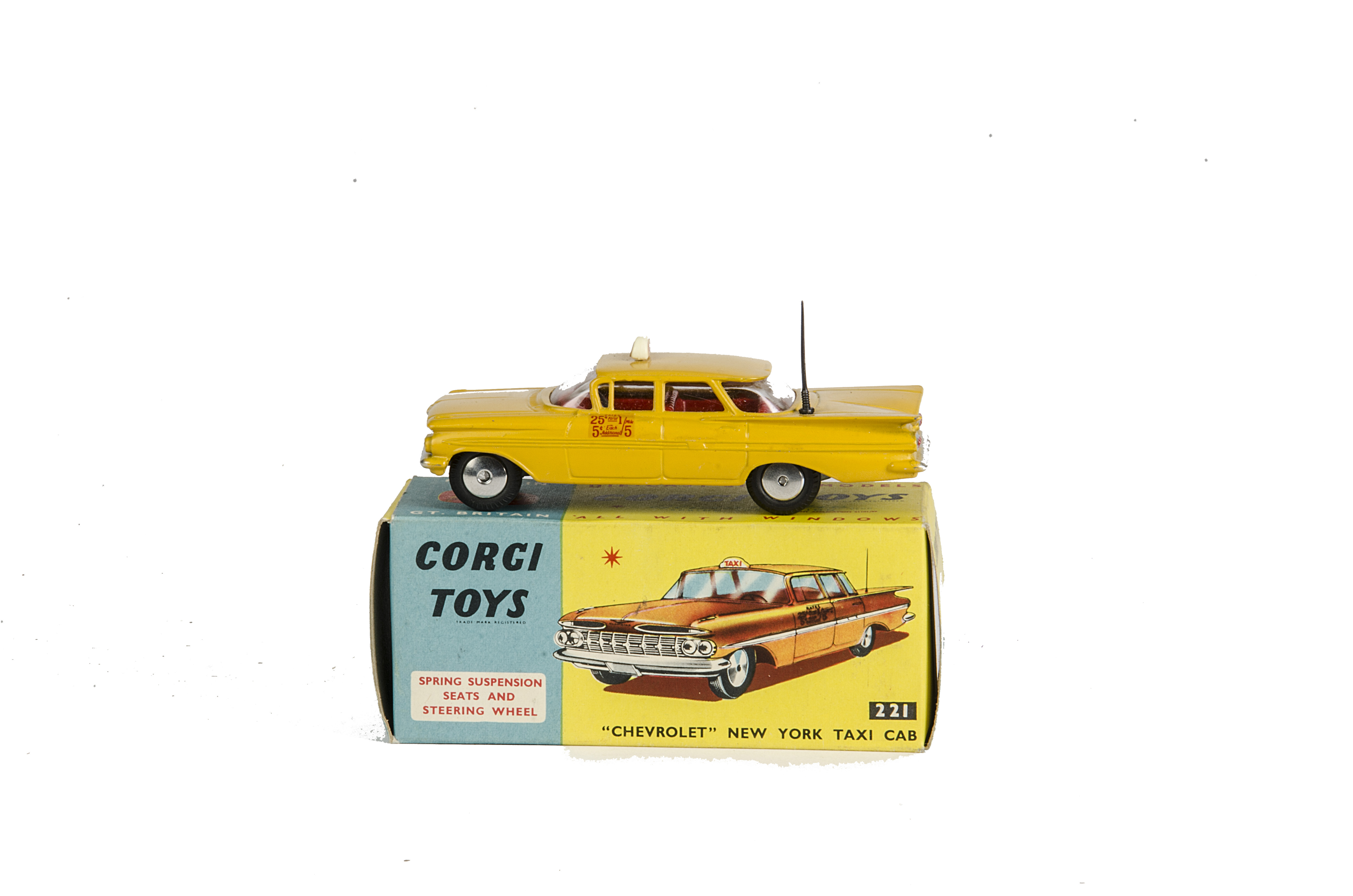 A Corgi Toys 221 Chevrolet Impala New York Taxi Cab, yellow body, red interior, spun hubs, in