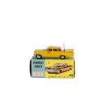 A Corgi Toys 221 Chevrolet Impala New York Taxi Cab, yellow body, red interior, spun hubs, in