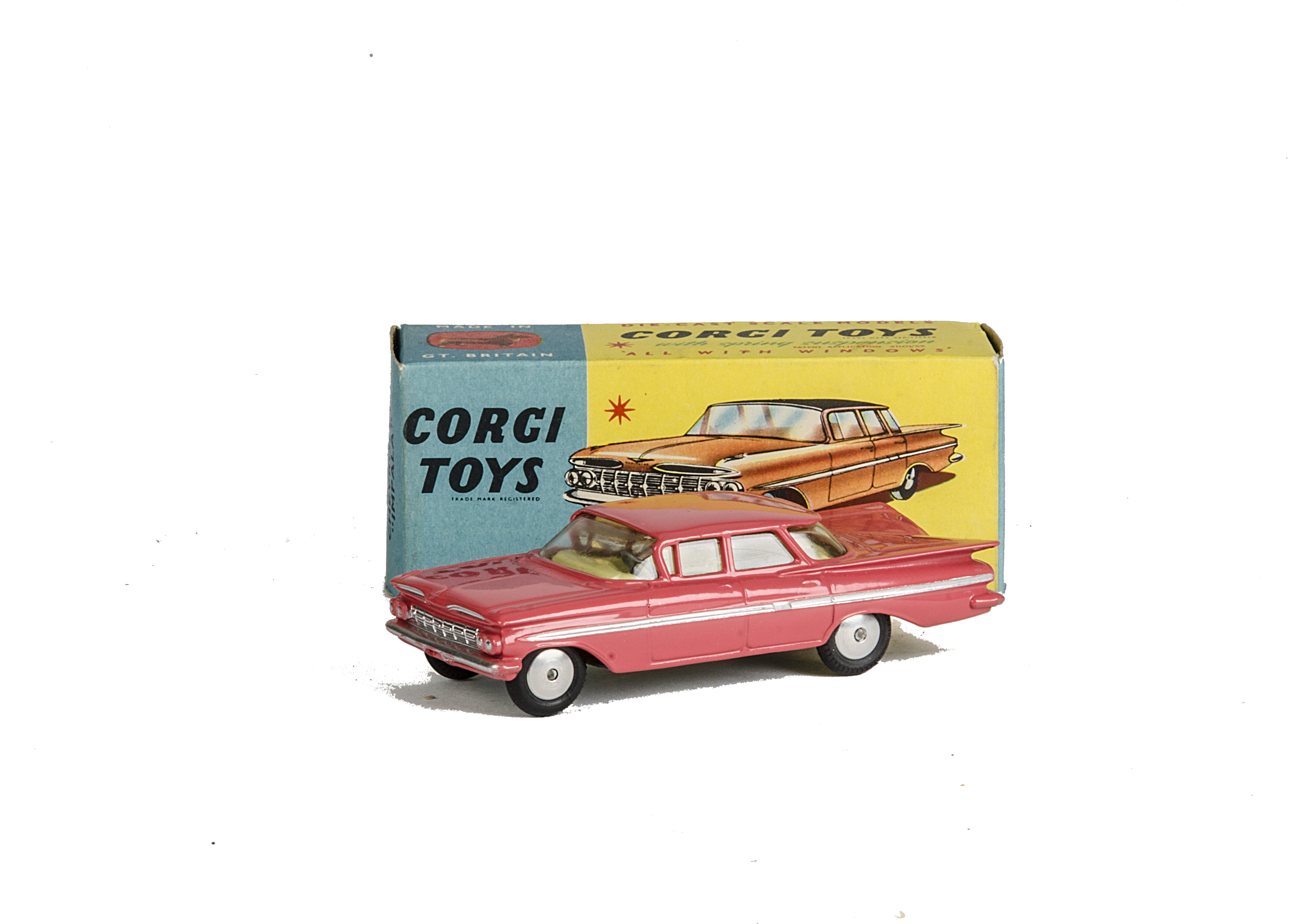 A Corgi Toys 220 Chevrolet Impala, pink body, lemon interior, spun hubs, in original box, E, box