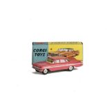 A Corgi Toys 220 Chevrolet Impala, pink body, lemon interior, spun hubs, in original box, E, box