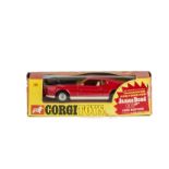 A Corgi Toys 391 James Bond Mustang Mach 1, red body, black bonnet, off-white interior, dish wheels,