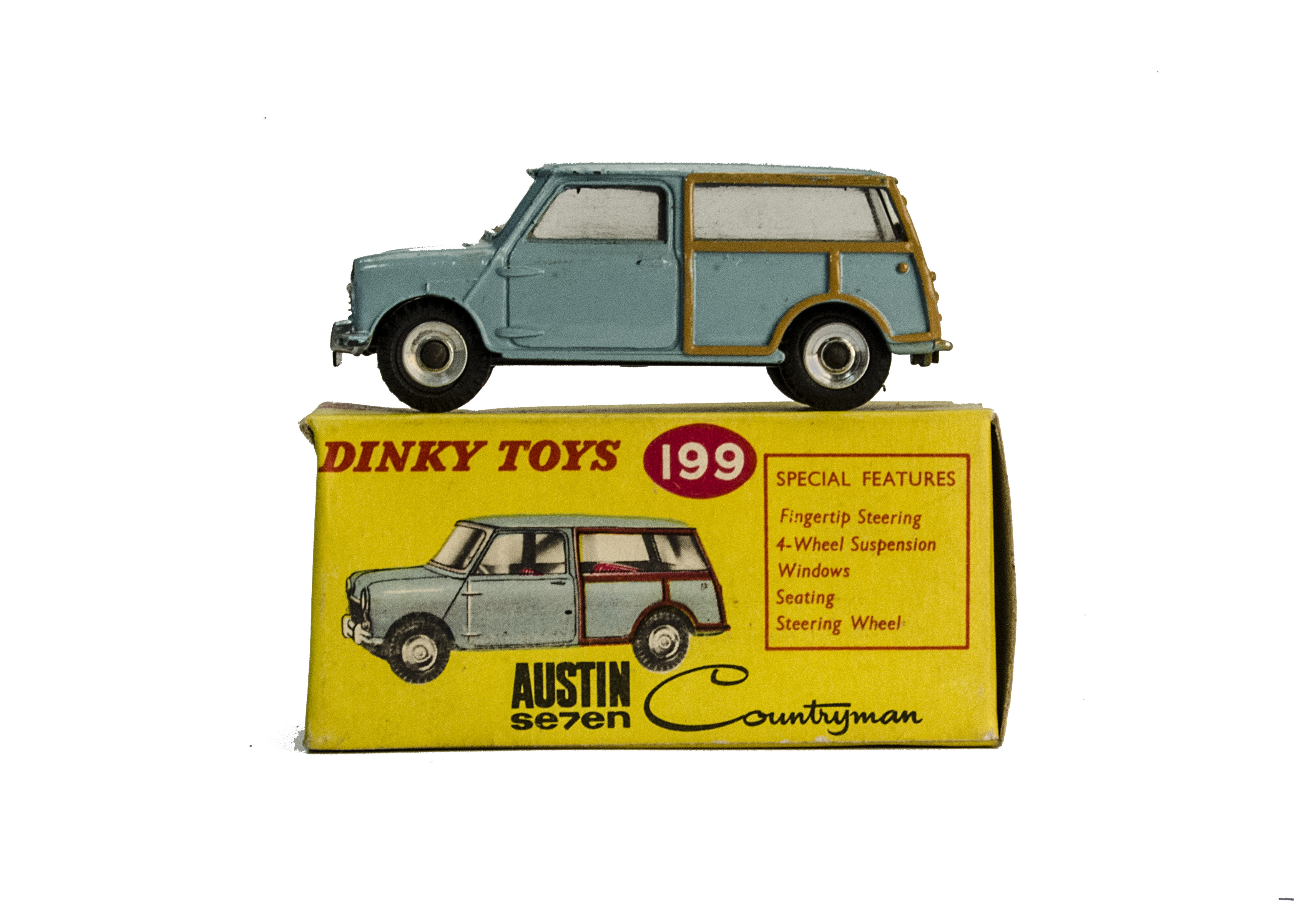 A Dinky Toys 199 Austin Seven Countryman, light blue body, red interior, spun hubs, in original box,