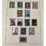 An Austrian stamp album and four vacant albums, including a good 1950s to late 1960s Austrian album,