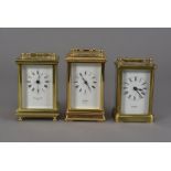 Three vintage and modern carriage clock timepieces, each of typical form, one marked Perse