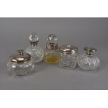 A group of five Victorian and later cut glass and silver dressing table items, including three