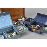 A collection of jewellery, presented in a walnut box and two jewellery boxes, including bead