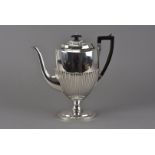 A late Victorian silver hot water pot by SWS, oval spreading foot with fluted lower, London 1892,