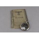 A WWII German officer's pocket watch and Wehrpass booklet, the Helios open faced pocket watch having