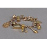 A 9ct gold charm bracelet, the hallmarked curb link chain united by heart shaped padlock clasp,