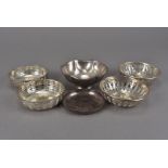 A group of six Victorian and later silver dishes, including a pair of pierced examples by Goldsmiths