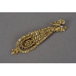 An interesting continental yellow metal and diamond stick pin, converted from an earring, the long