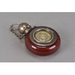 A Victorian glass scent scent bottle vinaigrette by Mordan & Co, the red circular body now
