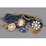 A collection of jewellery, including a yellow rope twist bracelet, a three strand lapis lazuli