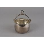 A modern Mexican silver drinking cauldron, the plain bowl with swing handle, marked to base, Tane