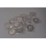 Fourteen 17th to 19th century coins, including five half crowns dated 1677, 1685, 1689, 1709 and