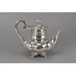 A fine George IV silver teapot, melon shaped on neo-classical supports with four claw feet, the