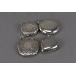 Four Victorian and later silver vesta cases, one heart shaped, two circular with engraved designs,
