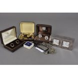 A collection of cufflinks, some in boxes, together with a Rolls Royce tie pin in box, a key ring