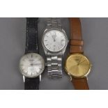 Three 1970s and later Seiko gentlemen's wristwatches, one a manual wind on black leather strap, 66-