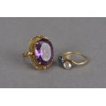 A vintage Middle Eastern yellow metal and synthetic colour changing Alexandrite cocktail dress ring,