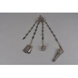 A fine 19th century continental silver and pinchbeck chatelaine, with a naval theme, the diamond