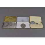 A collection of late Victorian coins, presented in year dated cigar tins starting from 1887 to 1901,