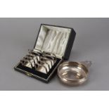 A pair of cased George V silver toast racks, together with sterling marked taste du vin by Lunt (4)