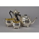 A George V Wedgwood Jasperware and silver mounted four piece tea set, together with a three piece