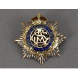 An Edwardian 15ct gold and enamel sweetheart badge, in white and yellow gold, with British Army