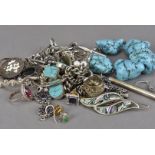 A good collection of silver and costume jewellery, including a heavy turquoise boulder bracelet