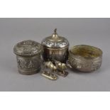 Five vintage Middle Eastern white metal and silver plated items, including a circular cover box, a