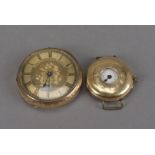 A late 19th century continental gold open faced pocket watch and an Edwardian 15ct gold half hunter,