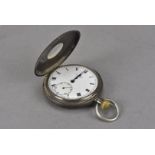 A vintage silver half hunter pocket watch by J.W. Benson, loose glass, appears to run