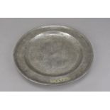 A late 17th century pewter charger, the circular dish stamped to lower and believed to be Edward