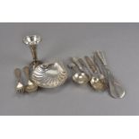 A late Victorian silver shell shaped butter dish, together with several small items of silver and