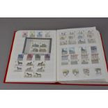 Two modern stockbooks of British stamps, relatively high face value due to some packs and sets,