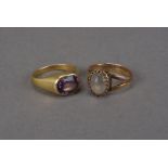 A 19th century gold and amethyst signet ring, unmarked, 5.5g and size O, together with a moonstone