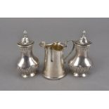 An Edwardian period silver cream jug by Hukin & Heath, together with a pair of similar period silver