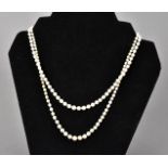 A certified natural and cultured pearl two strand necklace, having one strand of 107 natural