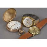 Three vintage watches, including a Marvin Revue Automatic wristwatch with day and date aperture, a