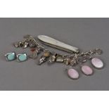 A vintage silver and white metal charm bracelet, together with a pair of Mexican silver and