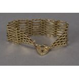 A modern 9ct gold gatelink bracelet, 19.7g, multiple bar chain with tapering ends, heart shaped