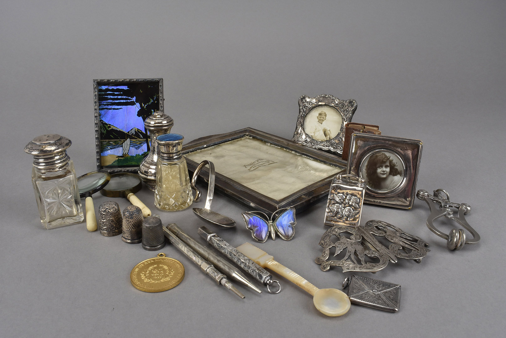 A collection of silver and other items, including four various sized photograph frames, a silver